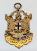 A 9ct gold and enamel medal for the Sheriff of London Charity Shield, inscribed 'SHERIFF OF LONDON