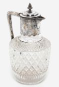 A Victorian silver mounted claret jug, by Henry Atkins, hallmarked Sheffield 1895, engraved with