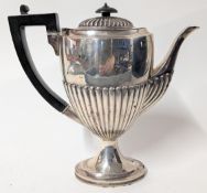 A Victorian silver Queen Anne style coffee pot, wooden handle, hallmarked London 1882, total