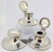 Three silver capstan inkwells, to include one hallmarked Chester, total weight approx 14.82oz (