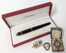 A silver medal, together with a Cartier ball-point pen, pin, and a Victorian gilt brooch set with