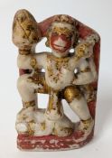 An Indian soapstone and gilt painted figure, height approx 14cm.