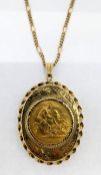 A George V gold half sovereign mounted into a 9ct gold locket on a 9ct gold chain, total weight 13.