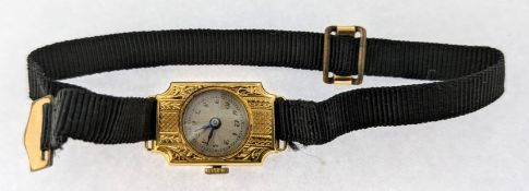 A small ladies gold cocktail watch, set in 18ct gold, inscribed to outer back case 'D.E.R.K From the