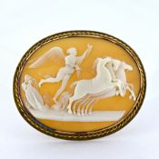 An oval cameo brooch, carved with a classical mythological scene, rope twist mount, metal pin,