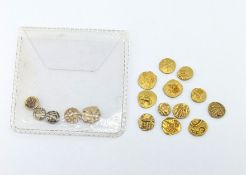 A collection of eleven various gold miniature gold coins, 4.5g, possibly Indian antique coins with