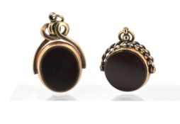 Two carnelian and bloodstone swivel fobs, including a 9ct gold circular swivel fob, diameter approx.