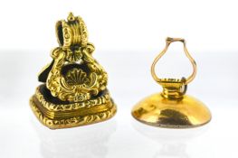 Two antique fob seals, including an ornately carved fob seal with a bloodstone carved crest,