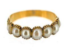 A Georgian pearl ring, set with seven graduated pearls, floral and foliate carved shoulders and
