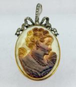 An antique diamond and mother of pearl cameo pendant,