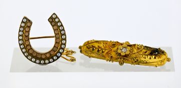 Two Victorian brooches, including a horseshoe brooch grain set with an outer row of seed pearls