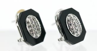 A pair of onyx and diamond earrings, octagonal in shape, each onyx plaque, the central raised