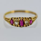 An antique ruby & diamond five stone ring,