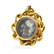 An 18ct gold compass and sardonyx double sided fob, openwork chain style mount, diameter approx. 2.