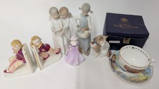 A collection of China ornaments, to include Nao figures of angels and a cat, Coalport figurine,