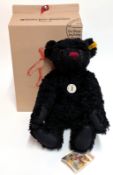 Steiff classic black mohair growler teddy bear with white chest tag and yellow ear tag, no.
