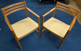 A pair of mid-century wood elbow chairs. (2)
