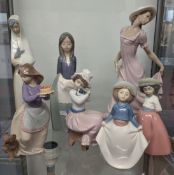 Nao, a collection of nine Nao figures, to include a lamp. (9)