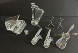 Swarovski Crystal Glass, Piano with stool, 2x Saxophone, Violin with Bow and Harp, boxed.