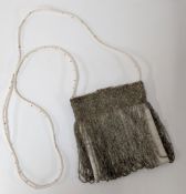 A vintage 1930s evening bag, with beaded fringe design.