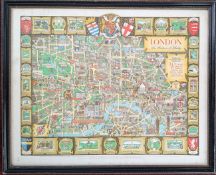 A vintage map of North London, in polychrome with landmarks highlighted, framed and glazed,