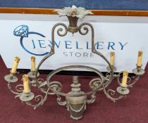 A blue glass and brass hanging lamp, together with a ceiling brass chandelier with urn decoration to