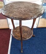 A carved wood Burmese round table, decorated with carved foliate motifes, height approx 71cm.