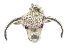 A George V silver longhorn bull's head pendant charm, red stone cabochon eyes, hallmarked London,