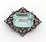 An antique aquamarine and diamond brooch, circa 1890-1910, claw set to the centre with a
