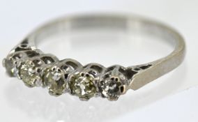 A five stone diamond ring, claw set with five graduated old-cut diamonds, marked 18ct, size L1/2,