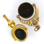 Two carnelian and bloodstone swivel fobs, including one with an ornate scalloped style mount,