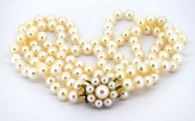 A 9ct gold triple row pearl choker necklace, three rows of knotted cultured pearls, pearls approx.