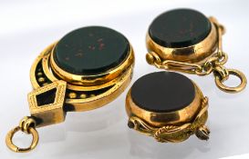 Three 9ct gold swivel fobs, each of varied design, two with carnelian & bloodstone, one with