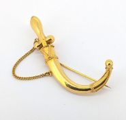 A Middle Eastern Jambiya dagger brooch, removable scabbard & rope twist decoration, safety chain,