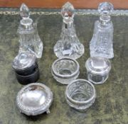 A collection of various silver and glass inkwell pots and bottles. (8).