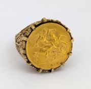 A half sovereign ring, a 9ct gold ring mount set with a George V 1914 half sovereign, hallmarked