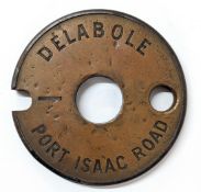 A Tyer's No6 brass single line tablet DELABOLE - PORT ISAAC ROAD, stamped 'Not in Use' verso.