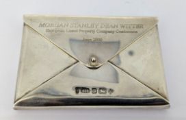 A silver card case, hallmarked Birmingham 2000, total weight approx. 2.82 oz.