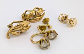 Three pairs of earrings, including a pair of screw back earrings, each set with a paste stones
