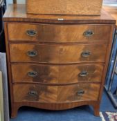 A mahogany serpentine chest, fitted with four drawers, on splayed feet, of Georgian style
