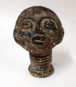 A decorative African-style bust, height approx. 24cm.