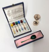 A silver pepper mill Garrard and Company London, height 9cm, together with a silver and enamelled