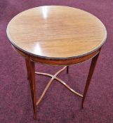 An early 20th century satinwood round table, height approx. 70cm.