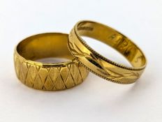 Two 18ct gold wedding bands, of varied design and sizes, hallmarked, total gross weight 7.9grams