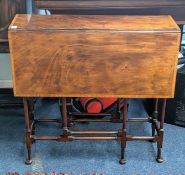 Early 20th century mahogany drop flap table on spider legs, depth 72cm, length 82cm.