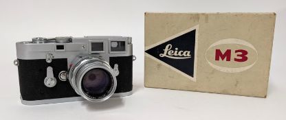 A 1950s-1960s Leica Rangefinder M3 camera, accompanied with a large collection of Leitz/Leica camera