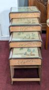 A nest of four Chinese carved wood tables, mid/early 20th century (each with glass).
