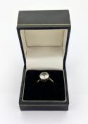 A 9ct synthetic stone ring, with box.