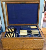 A canteen of Mappin & Webb silver-plated flatware, in an original fitted box, oak with recessed