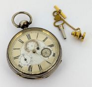 An open face pocket watch, c.1880-1900, with roman dial and includes seconds, compass, and barometer